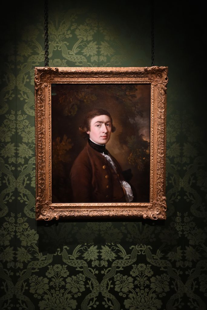 An image of the framed, self-portrait of Thomas Gainsborough in the Gainsborough Gallery.