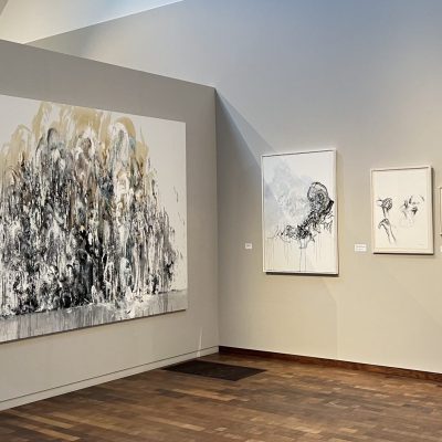 Maggi Hambling origins - exhibition at Gainsborough's House. There are four, various sized pieces of contemporary artworks on the wall.
