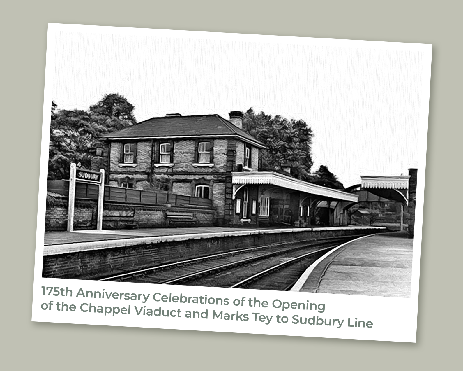 An image of a polaroid on a grey background. The polaroid has an image of Sudbury Railway Station on it with the caption beneath: 175th anniversary celebrations of the opening of the Chappel Viaduct and Marks Tey to Sudbury Line.