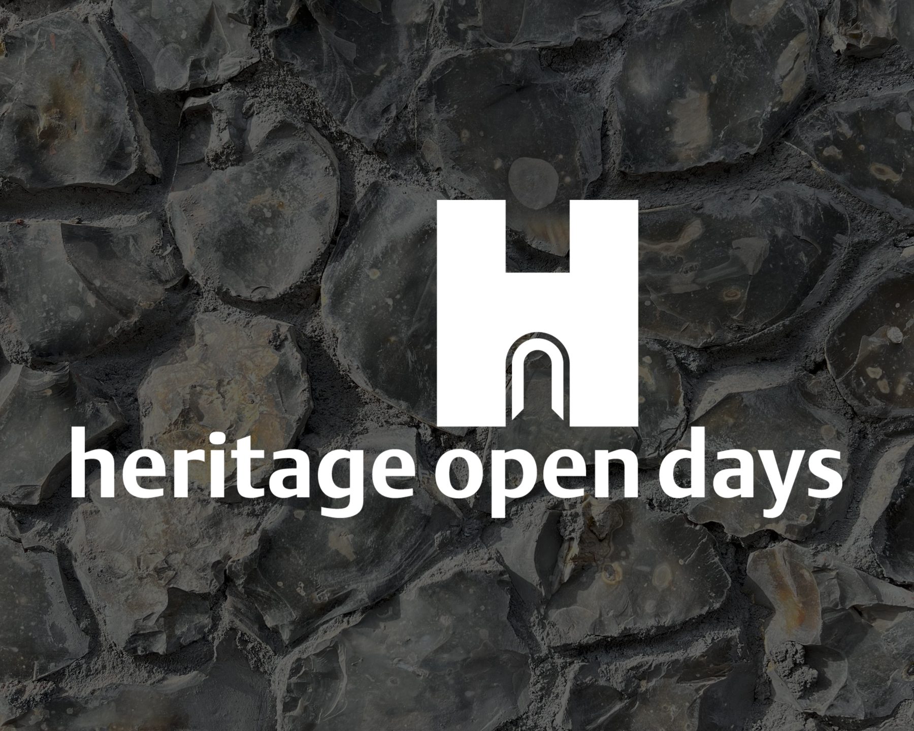 An image of a flint wall with a dark overlay. Overlayed is the Heritage Open Days logo in white.